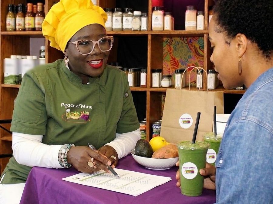 Chef Tatiana reviewing a customized nutrition plan with a client